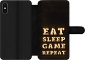 Bookcase Geschikt voor iPhone XS telefoonhoesje - Gaming - Games - Quotes - Spreuken - Eat sleep game repeat - Met vakjes - Wallet case met magneetsluiting