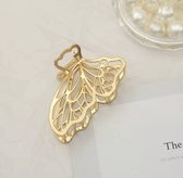 Emilie collection - haarklem - goud - geometrisch - metaal - vlinder