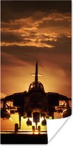 Poster Een silhouet van een straaljager tijdens een zonsondergang - 60x120 cm