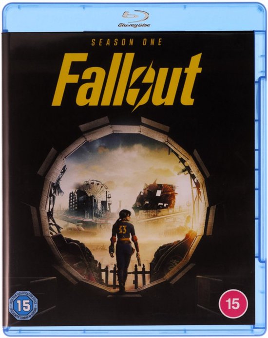 De voorkant van de Fallout Blu-ray: met een vrouw in een geel-blauw pak die naar een post-apocalyptische wereld kijkt.