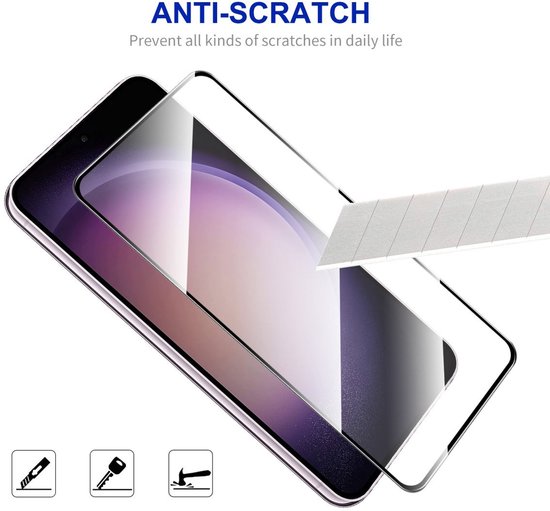 Protecteur d'écran en verre posé sur un smartphone, avec un cutter.
