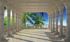 Fotobehang - Vlies Behang - 3D Uitzicht op de Tropische Palmbomen vanaf het Terras met Pilaren - 312 x 219 cm
