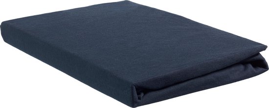 Donkerblauw jersey topper hoeslaken gevouwen.