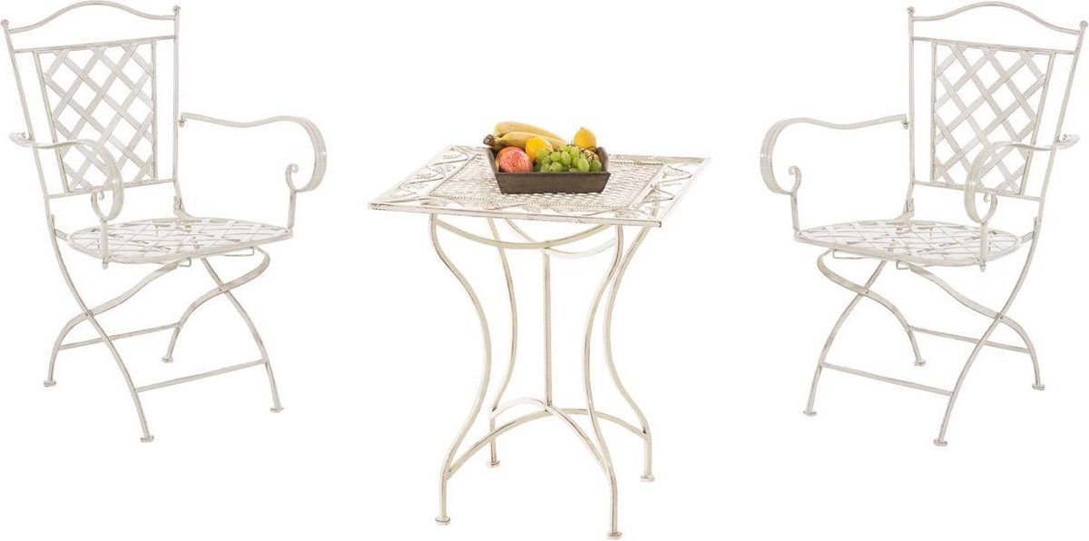 Antieke crèmekleurige CLP Payo tuinset met tafel en stoelen.
