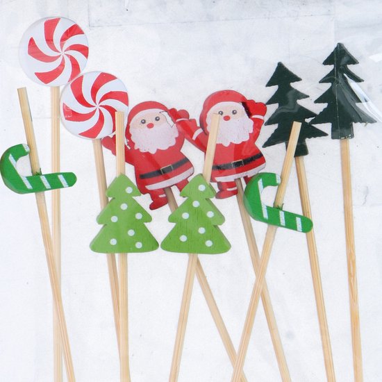Kerst cocktailprikkers met kerstbomen, kerstmannen, lolly's, en kerststokjes.