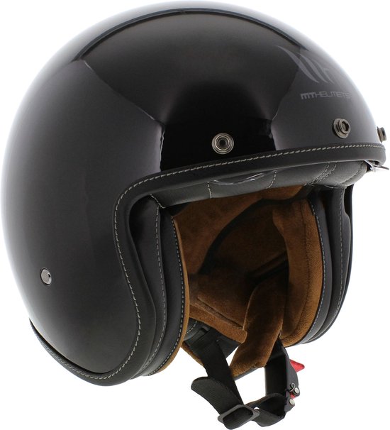 Zwarte glanzende helm met bruine voering en zwarte rand. Het MT Helmets logo is zichtbaar op de helm.