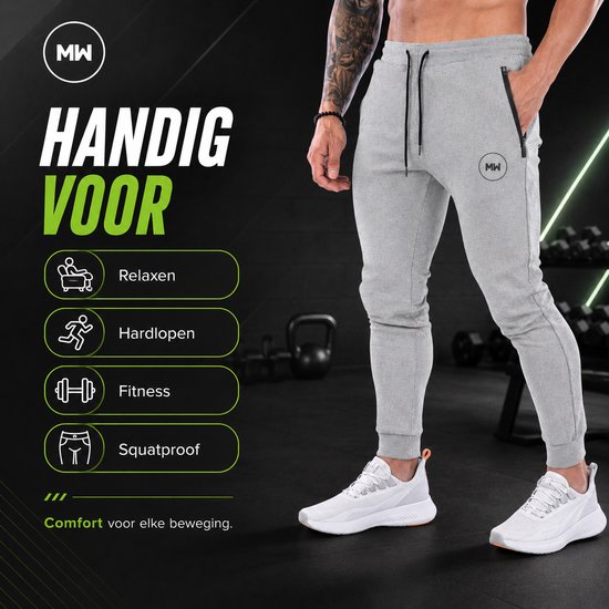 Grijze trainingsbroek met MW logo, ritszakken en trekkoord. "Handig voor relaxen, hardlopen, fitness, squatroof". Comfort voor elke beweging.