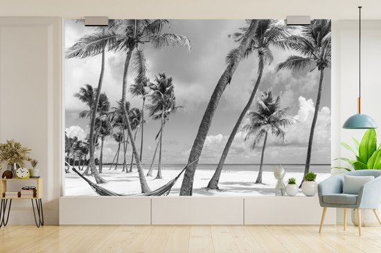 Behang - Fotobehang Uitsnede hangmat op strand in Dominicaanse Republiek - Breedte 420 cm x hoogte 280 cm
