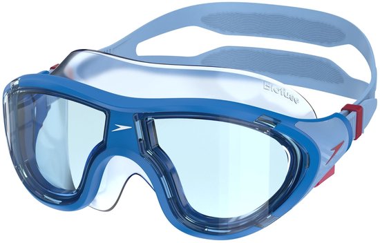 Lunettes de natation Speedo bleues avec verres clairs, accents rouges et sangle rayée.