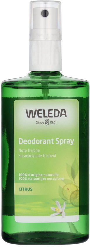 Groene Weleda Citrus Deodorant Spray fles met witte dop en een label met citroenen en een bloem.