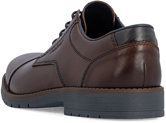 Bruine leren veterschoen met donkerblauwe accenten en een grijze zool.
