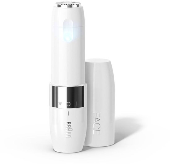 Compacte, witte gezichtshaar trimmer met een zilveren ring en een doorzichtige kap.