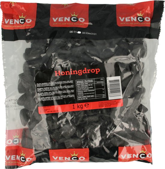 Zwarte honingdrop van Venco in een zak van 1 kg, met rode en zwarte branding en nutritionele informatie.