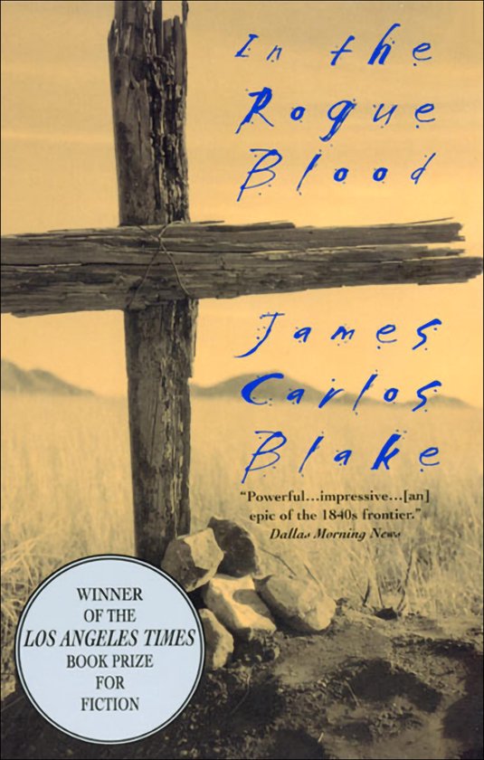 Couverture du livre 'In the Rogue Blood' de James Carlos Blake, avec une croix dans le désert, lauréat du Los Angeles Times Book Prize.