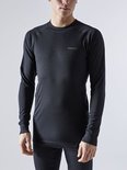 Zwart thermoshirt met lange mouwen, geribbelde stof en subtiel 'Craft' logo op de borst.