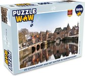 Puzzel De Koppelpoort aan het water in Amersfoort - Legpuzzel - Puzzel 1000 stukjes volwassenen