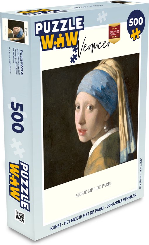 Boîte d'un puzzle de 500 pièces représentant 'La Jeune Fille à la perle' de Vermeer. Le puzzle montre une femme avec un foulard bleu et une perle.