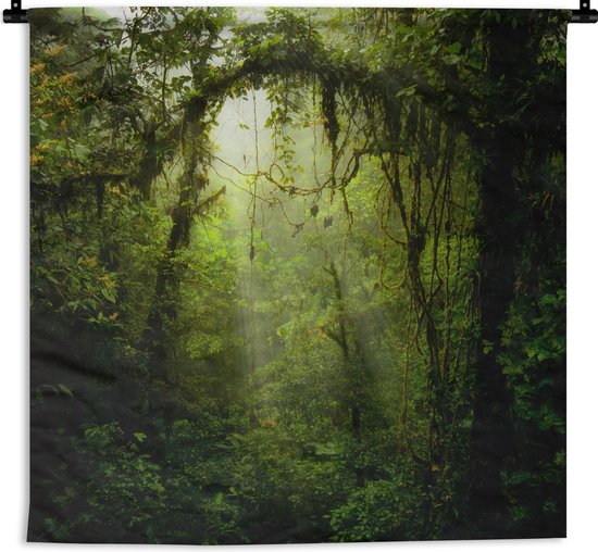 Wandkleed Diep in de jungle - Zonnestralen glippen door het tropische bladerdak Wandkleed katoen 90x90 cm - Wandtapijt met foto