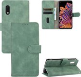 Voor Samsung Galaxy XCover Pro effen kleur huid gevoel magnetische gesp horizontale flip kalf textuur PU lederen tas met houder & kaartsleuven & portemonnee (groen)