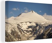 Canvas Schilderij Zon beschijnt een gletsjer in het Nationaal park Hohe Tauern in Oostenrijk - 120x80 cm - Wanddecoratie
