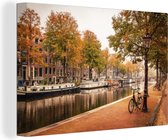Canvas Schilderij Amsterdam - Fiets - Herfst - 90x60 cm - Wanddecoratie