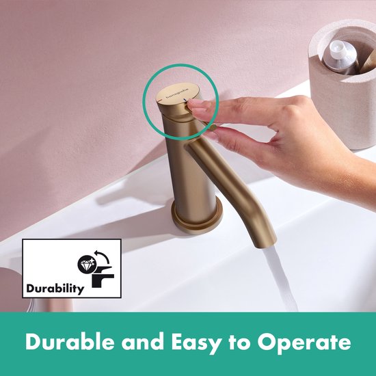 Geborsteld bronzen Hansgrohe wastafelkraan met een hendel. Handen wassen.