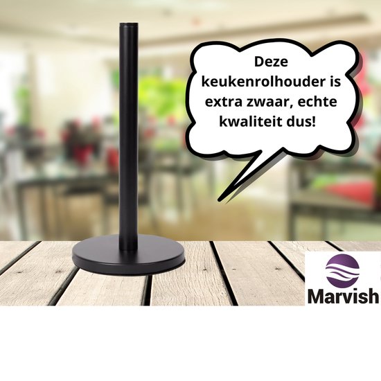Zware, zwarte keukenrolhouder met een ronde voet op een houten tafel.