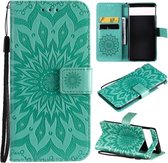 Voor Google Pixel 6 Pro Zon Embossing Patroon Horizontale Flip Leather Case met Kaartsleuf & Houder & Portemonnee & Lanyard (Groen)