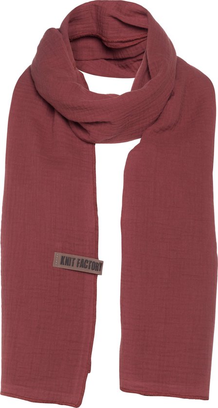 Rode, langwerpige katoenen sjaal met bruin 'Knit Factory' label.