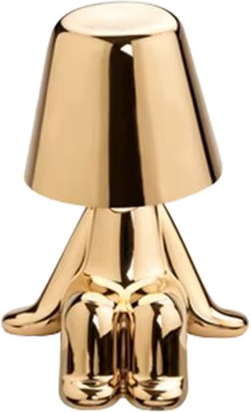 Une lampe 'Bins Brother' dorée brillante sur fond blanc.