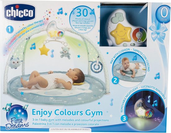 Verpakking van een babygym met een baby, de mat en het nachtlampje. Tekst 'Enjoy Colours Gym' en '3-in-1 baby gym'.