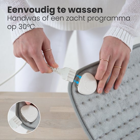 Lichtgrijs Auronic warmtekussen met zachte fleece stof, met de tekst "Zijdezacht fleece".