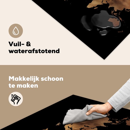 Zwarte inductiebeschermer met bronzen wereldkaart, erop liggen waterdruppels.