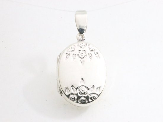 Médaillon en argent fin avec gravure florale