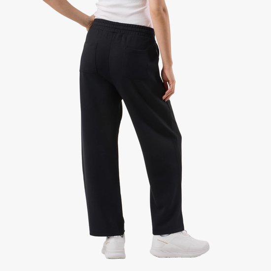Achterkant van zwarte wijde joggingbroek met trekkoord en 'SEASIDE' logo.