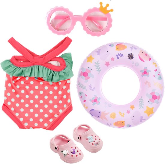 Roze badpak met stippen, ruches, lichtpaarse zwemring met zeedieren, roze clogs, roze zonnebril met kroontje.
