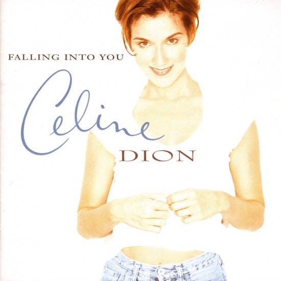 Celine Dion op de hoes van 'Falling Into You', draagt een witte top en spijkerbroek.