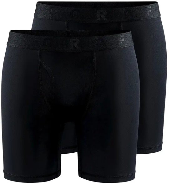 Twee zwarte heren sportonderbroeken van Craft met elastische tailleband.
