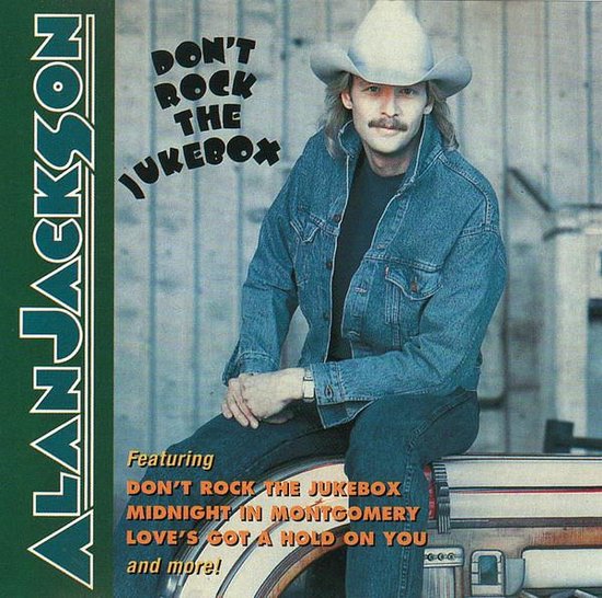Alan Jackson in een spijkerjack en cowboyhoed, met de tekst 'Don't Rock The Jukebox'.