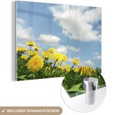 MuchoWow® Glasschilderij 150x100 cm - Schilderij acrylglas - Wolken - Paardenbloem - Lente - Foto op glas - Schilderijen