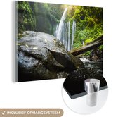 MuchoWow® Glasschilderij 60x40 cm - Schilderij acrylglas - Rotsblok in de jungle van het Nationaal Park Gunung Rinjani in Indonesië - Foto op glas - Schilderijen