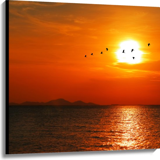 Canvas - Silhouet van Zwerm Vogels bij Zonsondergang boven de Zee - 100x100 cm Foto op Canvas Schilderij (Wanddecoratie op Canvas)