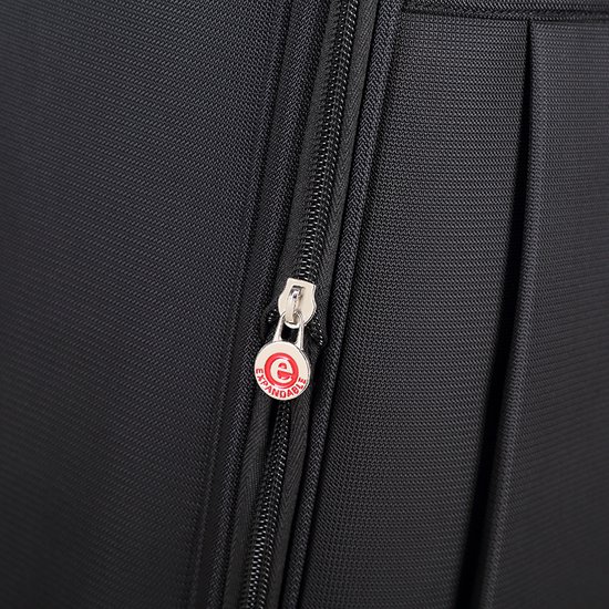Ritssluiting met ronde 'Expandable' bedel op een zwarte koffer.