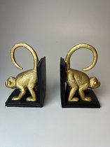 Set van 2 gouden apen boekensteunen