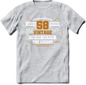 58 Jaar Legend T-Shirt | Goud - Wit | Grappig Verjaardag en Feest Cadeau Shirt | Dames - Heren - Unisex | Tshirt Kleding Kado | - Licht Grijs - Gemaleerd - L