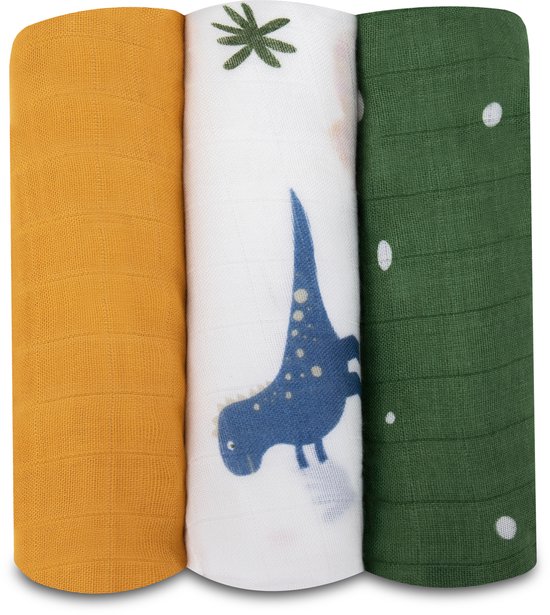 Drie hydrofiele doeken gerold: mosterdgeel, wit met blauwe dino en groen met witte stippen.