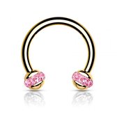 Piercing horseshoe rond gold plated met roze steen