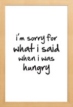 JUNIQE - Poster in houten lijst hungry -40x60 /Zwart