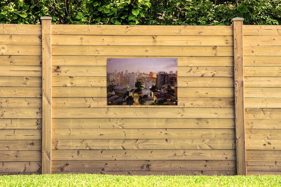 Tuinposters buiten Een roze getinte schemering valt over São Paulo in Brazilië - 90x60 cm - Tuindoek - Buitenposter