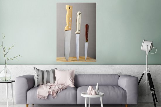 Poster Couteaux dans une planche à découper 80x120 cm - Tirage photo sur Poster (décoration murale salon / chambre)